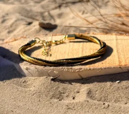 Bracelet "Éclipse Naturelle" – Tressage Bicolore Or Végétal et Noir